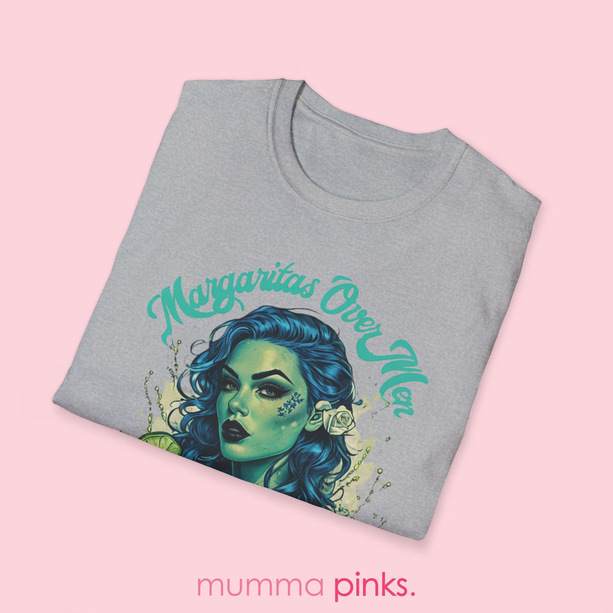 Classic fit Gildan 64000 t-shirt featuring a gothic woman with striking blue curly hair, a lime green margarita glass, and the bold slogan ‘Margaritas Before Men.’ Sassy, statement tee for tequila lovers and independent queens