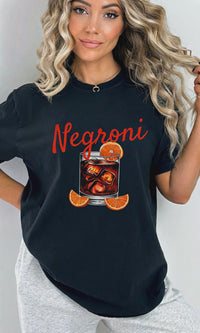 Comfort Colors oversized t-shirt with bold 'Negroni' cocktail graphic, vintage aesthetic, and Aperitivo vibes.